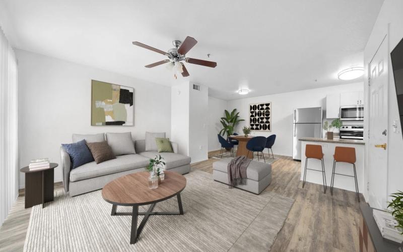 a living room with a fan